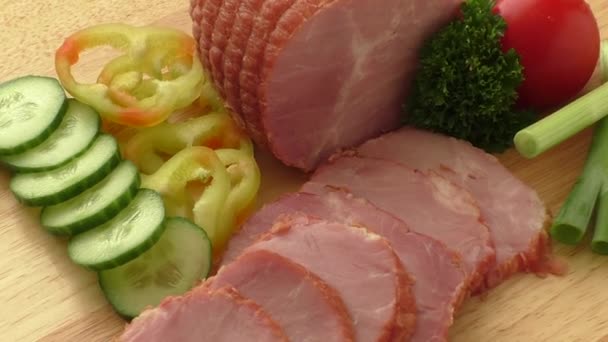 Smoked meat on wooden board, selective focus — Stock Video