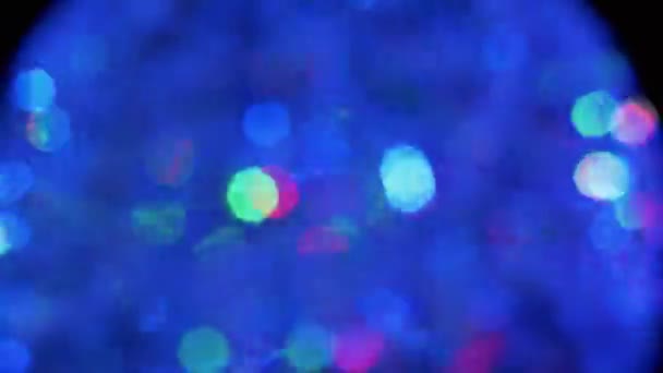 Spinning LED Disco Ball Świecące neony w rozmytym ruchu. 4K. Zbliżenie — Wideo stockowe