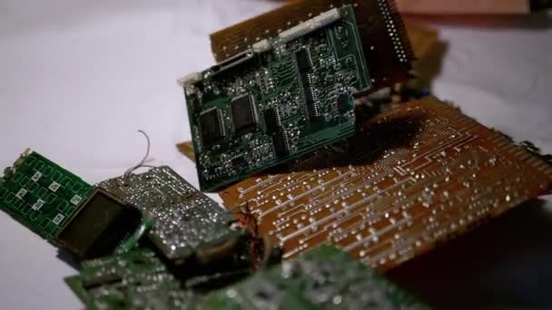 Old Printed Circuit Boards, Microcircuits, Radio Components Falling on Table — Stock Video