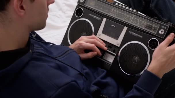 Man holding an Old Retro Audio Recorder, Closely Examining, Touches with Fingers — Stock Video