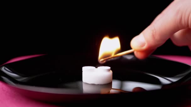 Male Hand Sets Fire to Dry Alcohol with Pills a Burning Match. Pharaohs Snakes — Stock Video