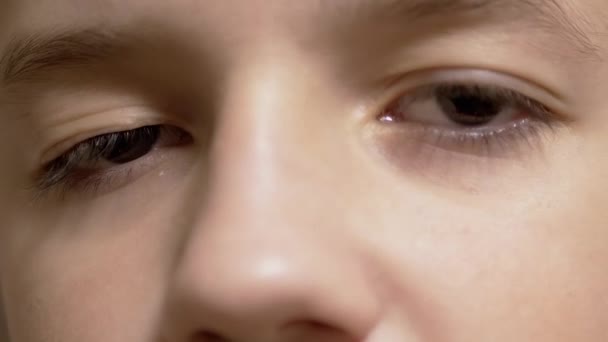 Ptosis of Upper Eyelid in Boy Long Lashes. Myopia. Rolling Pupil Under Eyelid — Stock Video
