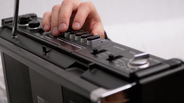 Male Hand Presses Play Button on Retro Tape Recorder with Antenna. 4K. Close-Up — Stock Video