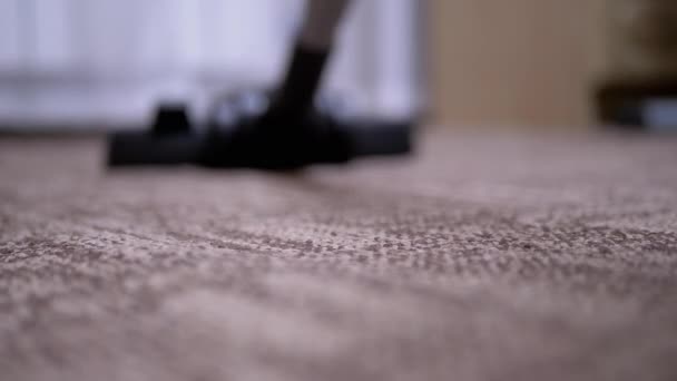 Woman, Housewife Vacuums Brown Carpet at Home. Cleaning, Order in Room. 4K — Stock Video