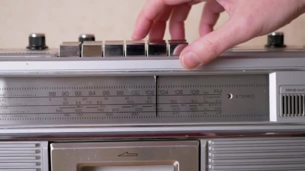 Female Hand Presses Play Button on Retro Tape Recorder with Cassette. Zoom — Stock Video