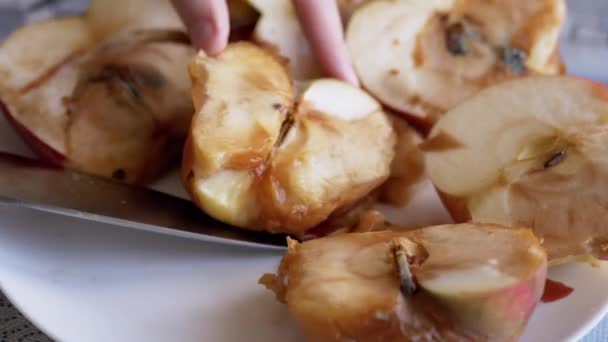 Woman with a Knife Points to Moldy Apples on a Plate. Cut, Spoiled, Moldy Fruits — Stock videók