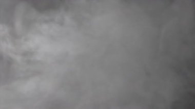 Çeşitli yaratıcı projeler için girdaplı duman efektleri içeren yüksek kaliteli soyut arkaplanları keşfet