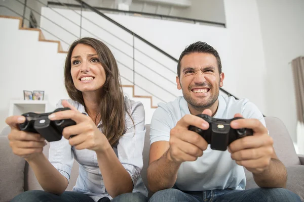 Young couple playing video game