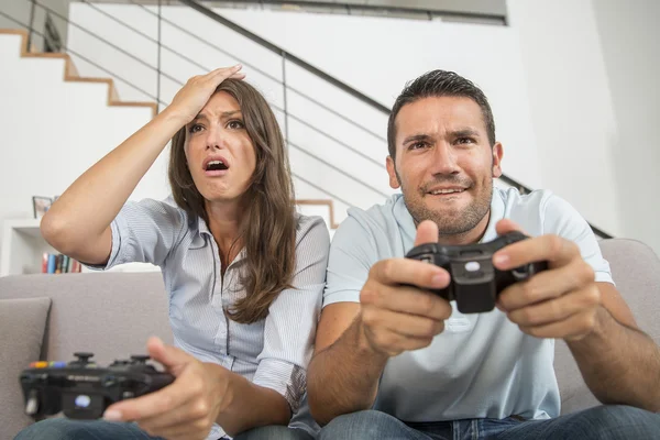 Young couple playing video game — Stock Photo, Image