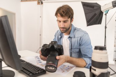 photographer working in office clipart