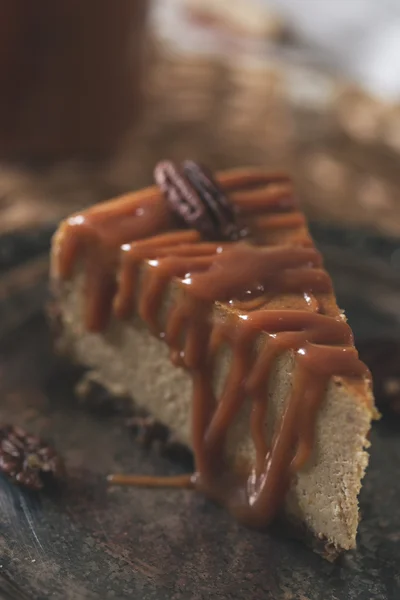 Pumpkin cheesecake with caramel sauce — Stock Photo, Image