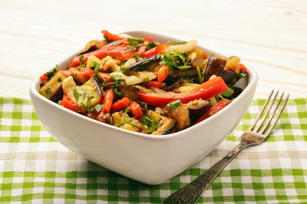 Appetizer - salad with grilled egplants, paprika and garlic. — Stock Photo, Image