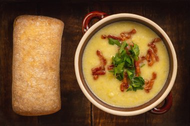 Creamy leek soup with bacon and cheese.