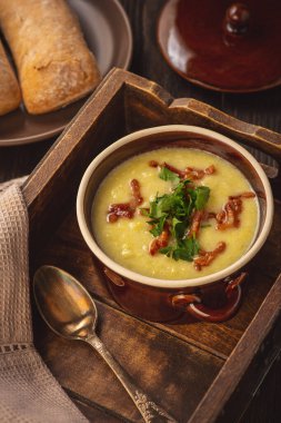 Creamy leek soup with bacon and cheese.