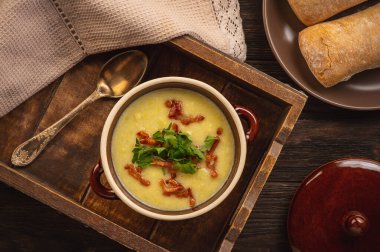 Creamy leek soup with bacon and cheese.