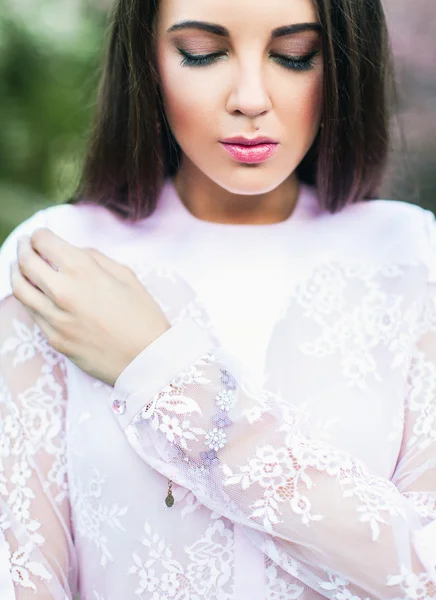 Woman wearing white dress — Stock Photo, Image