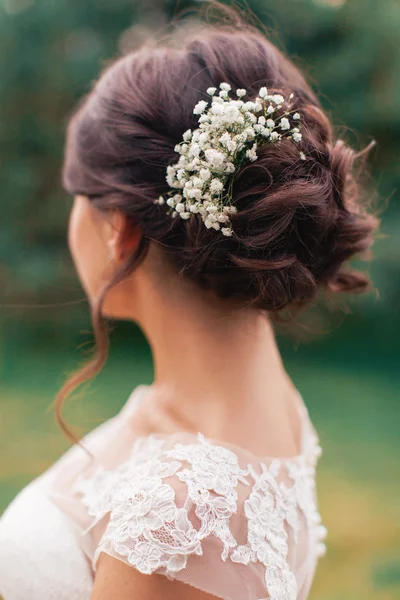 Bride with flowers in hair — Stock Photo, Image