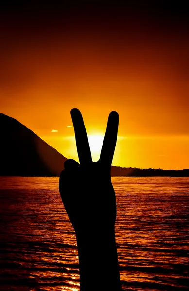 V-sign at sunset — Stock Photo, Image