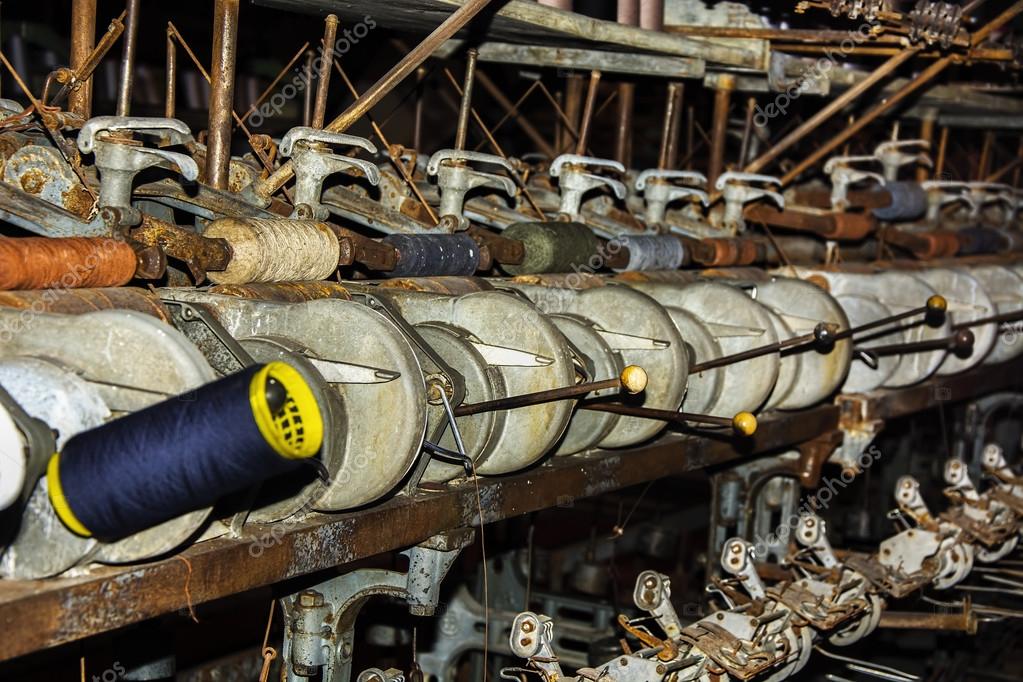 Old textiles and yarn machine Stock Photo by ©aosmanpek@gmail.com 106742982