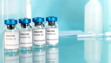 Coronavirus covid-19 'a karşı aşı şişeleri ve pandemik konsept. Koronavirüsü durdurun. Laboratuvarda aşı ile Covid-19 aşısı..