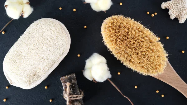 Anti cellulite dry brush and washcloth with salt soap for perfect skin. Spa and wellness concept. Scrubbing body. Homemade cosmetics for peeling and spa care.