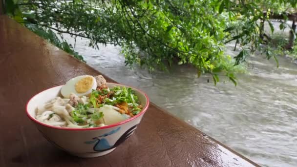 Bowl of noodle soup in a rainy day — Stock Footage Bowl of noodle soup in a rainy day Stock Video