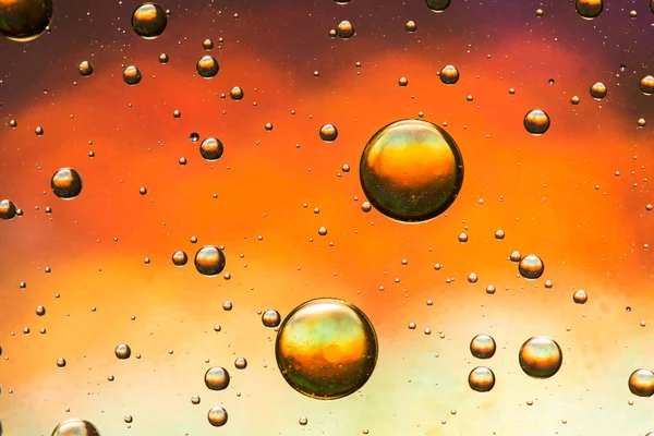 Gold, orange and red oil and water abstract — Stock Photo, Image