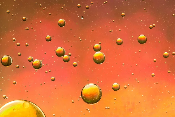 Orange and gold oil and water abstract — Stock Photo, Image