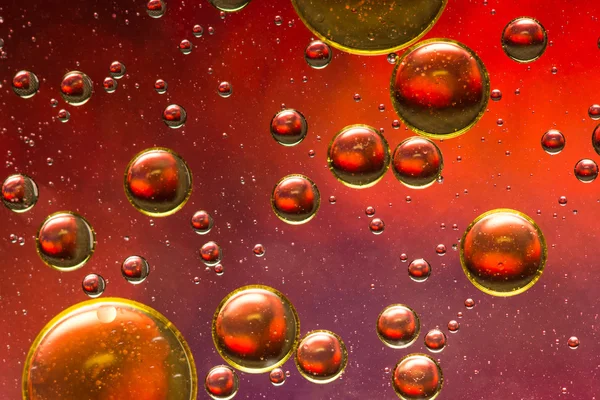 Red purple and gold oil and water abstract — Stock Photo, Image