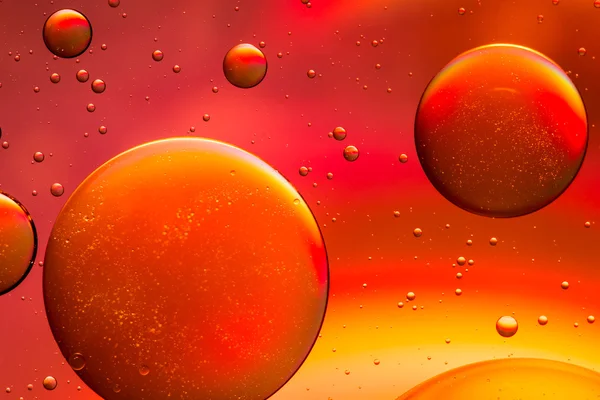 Yellow, orange and red oil and water abstract background — Stock Photo, Image