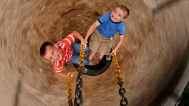 Boys Spinning Tire Swing