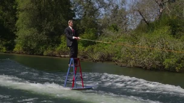 Water skiing on ladder — Stock Video
