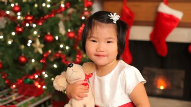 Portrait of young girl holding toy — Stock Video