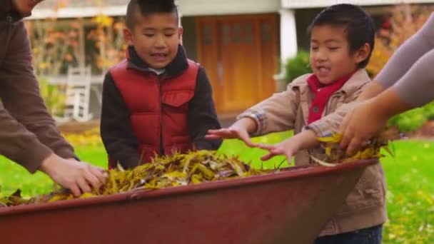 Family playing in fall — Stock Video