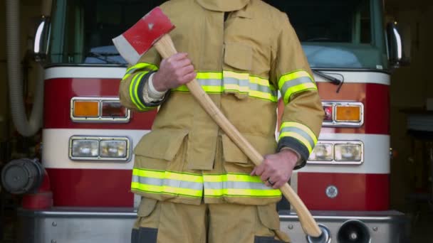 Firefighter portrait in front of firetruck — Stock Video