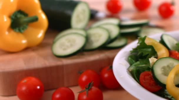 Salad falling into bowl — Stock Video