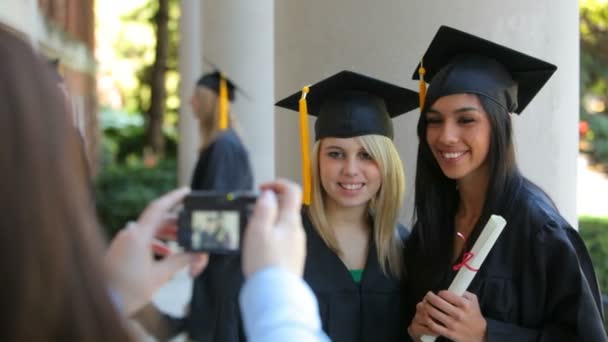 Graduates taking photos — Stock Video