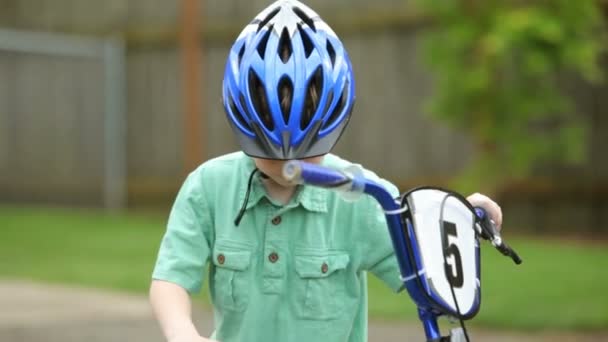 Portrait of boy with bicycle — Stock Video