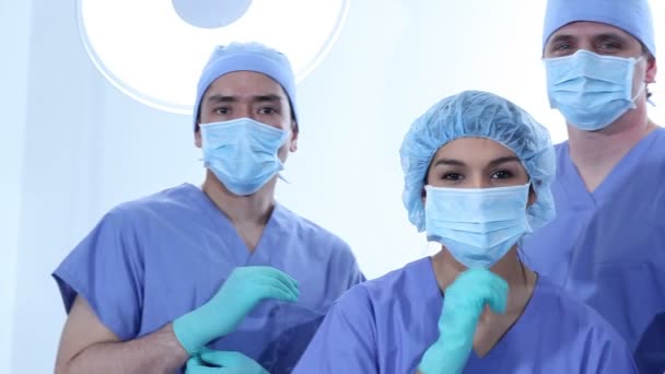Group of surgeons in scrubs — Stock Video