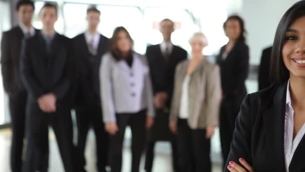 Portrait of businesswoman with coworkers — Stock Video