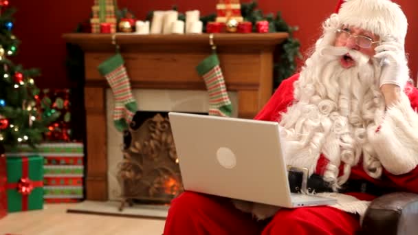 Santa Claus with laptop — Stock Video