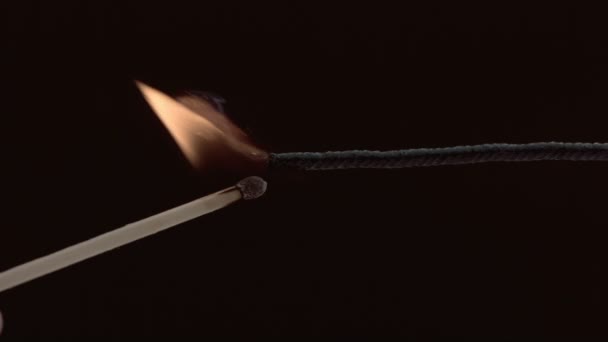 Lighting a fuse with match — Stock Video