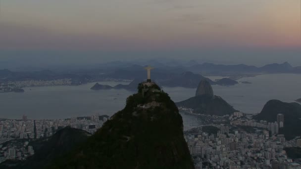 Christ the Redeemer statue at dusk — Stock Video