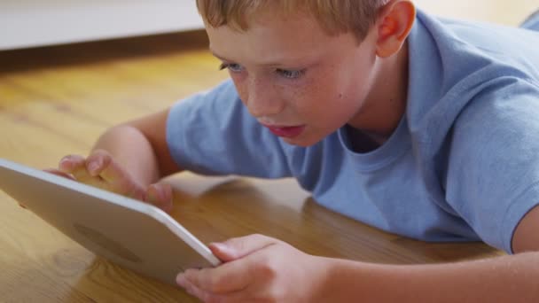 Boy using digital tablet — Stock Video