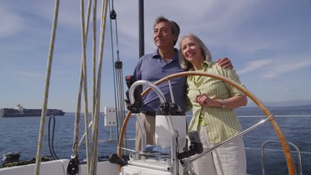 Senior couple on sailboat — Stock Video