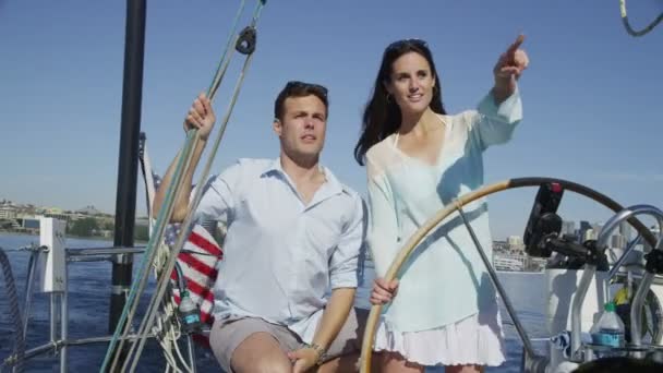 Couple on sailboat — Stock Video