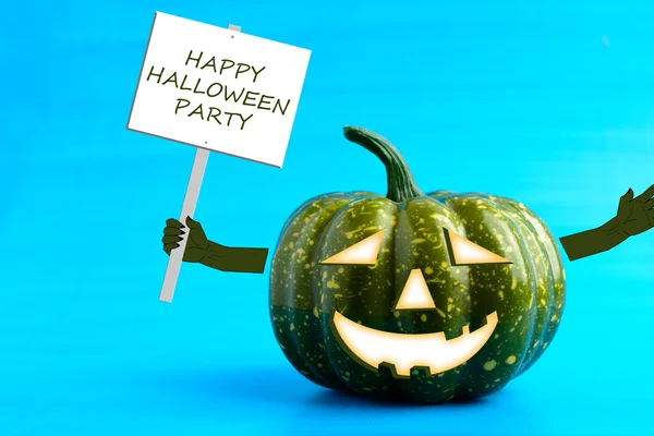 Halloween tök egy poszter a kezében — Stock Fotó