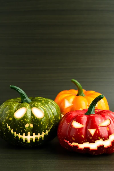 Drie Halloween pompoen met eng gezicht — Stockfoto