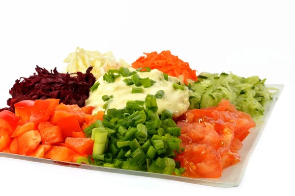 Salad of different kinds vegetables with sour cream — Stock Photo, Image