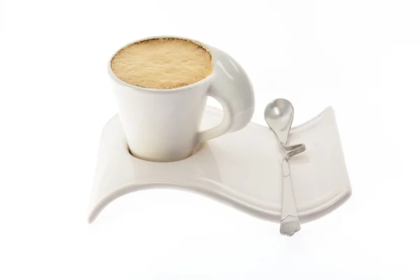 Tasse de café avec du lait sur un beau stand — Photo